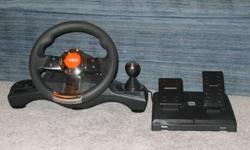 Steering wheel, gas and brake pedals, gear shift stick
Vibration feedback
Great with GT5
Call 229-2523