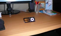 I have an Ipod Nano with a black case with a stand,  works exellent