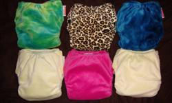 6 size small JamTots BerryPlush AIO cloth diapers - these will fit babies from 9-18lbs.  Each diaper comes with one snap in Minkee layered Hemp Soaker. 
 
All in excellent used condition - no damage and all stain free.  From smoke free home.
 
Asking $15