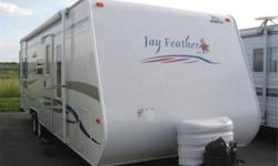 This trailer is in excellent condition!  With Jack and Jill bunks on one end and a slide out queen size bed on the other end there is tons of space for the full kitchen (with oven, stove, microwave, fridge/freezer, double sink), the full bathroom (with a