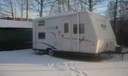 19 foot. Great weekender, fully loaded, hardly used, weighs 2935, easy to pull with mini-van or smaller truck, sleeps 5,