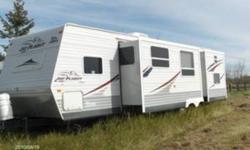 31 foot Jayco Jay Flight for Sale.  Has two slide outs.Bunk beds in the back and parents room in the front. Two 30lb. propane tanks. 7200 lbs. dry weight. Great family trailer.