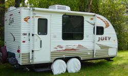 Trailer slept in 9 nights better then new condition with special up grades.
  Front queen size bed
  Rear corner bath ..  Oak storage cabnets
  2 door friege gas elect. , oven,   air   , microwave,up graded stereo,inside     outside   speakers. TV hook