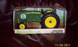 1990 Ertl John Deere 1:16 "Field of Dreams" 2640 Toy Tractor in the original box. This Tractor has a Field of Dreams plaque on the side and this model was the exact model used in the movie. Box shows a bit of wear.