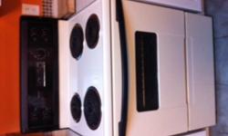 Kenmore Easy Clean Oven - in ivory colour.  Everything in working order.  Not a scratch, very clean.  $50 OBO.