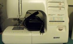 Just 3 years old, this Kenmore (model # 385.16782) comes with a walking foot for quilting, case and manual. Was purchased for just under $400.