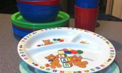 24 pieces that include plates, cups and bowls.  My kids got new ones for Christmas.