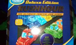 Rushhour Puzzle game in mint condition in box with all the pieces. Great puzzle game for anyone. Great addition to any Christmas gathering.