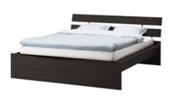 King Size bed frame for sale - less than a year old. We downsized to a queen mattress. It is the IKEA model "Hopen" and is in perfect condition with all hardware - comes with "SKORVA" midbeam which is required for this king frame (just took it apart).