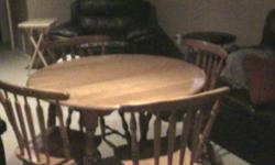 Kitchen table and 4 chairs also has one leaf