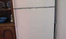 13 cubic foot fridge in great condition. Measures 66" high, 33" wide.