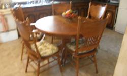 TABLE AND CHAIRS ARE MADE OF SOLID BIRCH TOP OF TABLE IS VANEER,2 MASTER CHAIRS AND 4 CHAIRS I PAID 10 YEARS AGO 3,500,00 OR MAKE AN OFFER.