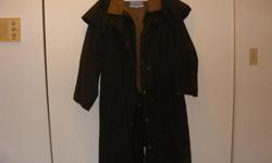 Long waterproof (oiled) coat for riding in the rain.
It says small but fits like a medium . In good condition.