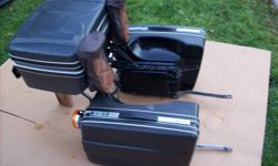 Here are some original Krauser Touring bags that were fitted to a Honda GL1000 Goldwing. The bags are universal but the brackts are specific. I have a GL1000 bracket. The bags and mounting bracket are included. The bags and trunk are in nice condition.