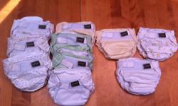 7 used Kushies cloth diapers in good used condition and 3 Kushies cloth diapers in fair used condition (have some small holes around the legs)
3 diapers laid out separate in the first picture are the ones with the holes
Second picture is an up close of