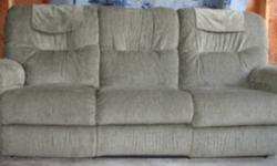 La-Z-Boy ? Casper? Sofa features:
Two reclining seats
Reclina-Way feature lets you recline all the way back, even with the couch sitting just inches away from the wall
Fabric is sage green with subtle cream, black and sage thread pattern
Durable and easy