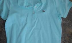 Light blue Lacoste polo. Womens size 40 (size M-L) Has been washed, but never worn.