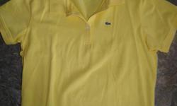 Yellow Lacoste Polo. Size 42 (womens Large) Has been washed, but never worn.