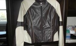 Brown/Ivory Color Ladies Jacket - SIZE LG.
 
PURCHASED AT LINDOR FOR $100 - ASKING $45.
WORN ONLY ONCE OR TWICE
 
PHONE:  270-5802