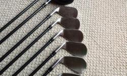 Set includes 8 clubs (sand wedge, pitching wedge, 9i, 8i, 7i, 6i, 5 hybrid and 4 hybrid) with head covers for the hybrids. Good condition with new grips.
