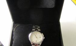 Seiko Ladies Dress Watch. Never worn. I won it in a contest but I don't wear watches.