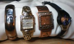 Bronze square bangle watch, worn once- $5
Gold tone cuff bracelet watch, slight signs of wear on bracelet  -$3
Bronze cuff bracelet with butterflies on band-$5
Timex, blue and black  band, water resistant, 2 scratches on the face near the 12 , just