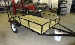 BRAND NEW LANDSCAPE TRAILER 5X8 ,2000 LB AXES & SPRINGS,4FT FOLD DOWN LOADING RAMP,175X80X13 TIRES.PRESSURE TREATED WOOD FLOOR,THE PRICE IS $1200 NO TAX.NO LOWBALLERS NEED REPLY