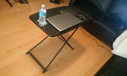 Black laptop stand that adjusts from 25 " to 28" in height
Frame is powder coated
Entire stand can fold for storage