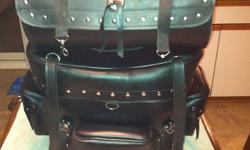 Large Leather Luggage Bag Including Top Roll. Used for one trip. Excellent condition. Contact Ron.