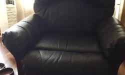 Black pure leather recliner chair as good as new from leons furniture.