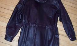 This coat is very warm, beautiful soft leather, 3/4 length, removable hood. Zips up, Then decorative buttons close it in place, there is a waist pull rope to give it a more Form Fit.
It is made by ALASKA Leather Garment, MONTREAL.
Size is MEDIUM.
Colour