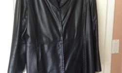 Knee length ladies black leather coat, Danier, Size 16, tapered in at the waist, excellent condition!