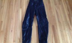Ladies leather motorcycle pants. Size small. Black leather in excellent condition. Zipper at lower leg to fit boots.