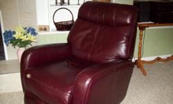 Burgandy electric recliner, used 4 months $800.00 1 250 746-4564