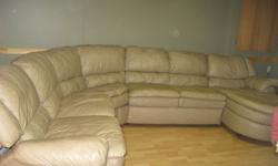 THIS IS A LARGE BEIGE COLOURED SECTIONAL RECLINER AT ONE END AND LOUNGE CHAIR AT THE OTHER EMAIL ME FOR MORE DETAILS
