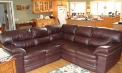 Beautiful all leather sectional sofa and matching recliner.  3 years old, in excellent condition.  Price of 1500.00 for set - firm.