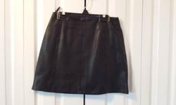 Ladies Black Leather "A" Line Skirt
Brand: Hugo Buscati
Size: 6
