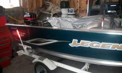 great fishing BOAT  LOW HOURS 2005 LEGEND model151 15.1 ft.LEGEND TRAILER. 25 HP 2 STROKE MERC.TWOFISH FINDERS FRONT AND BACK. MARINE RADIO SIDE CONSOLE LIVE WELL KEY START RUNS LIKE A NEW ONE STORED INSIDE ALL THE TIME  NO  TOP  AND DOWN RIGGER  6000