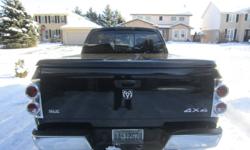 This is a fiberglass, like new hard top black tonneau cover.  It came off of my 2008 Dodge Ram 1500 Quad Cab.  Will fit 2002-2008 Dodge Ram 1500. 
Could be painted to match your truck.  Keep your cargo safe and protected from the elements.
Protect your