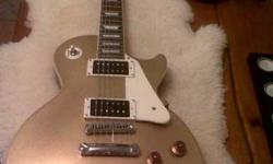 IF AD IS UP..  IT'S STILL AVAILABLE....... LIMITED EDITION CUSTOM SHOP 
 Gibson Epiphone  Les Paul  Standard Classic  U.S. Gold Top.
 RARE discontinued model, made for canadian and japanese markets,
brand new condition,
2 x Seymour Duncan Alnico II