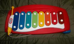 Like brand new!
It's time for your littlest tike to tap out a tune on the Tap-a-Tune Xylophone.
This 8 key, 8 color keyboard introduces your child to music in fun and easy way.
Colored chimes produce a full octave of tones making any tune possible and