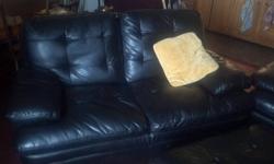 Black vinyl loveseat, chair and ottoman set in excellent condition - no rips, tears or stains. Very comfortable and stylish. This set is going for less than half the original purchase price. Will sell separately or as a set: Chair: $200; Loveseat $350;