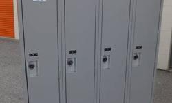 USED FULL DOOR LOCKERS with sloping top as required in the food industry (sloping tops also prevent clutter on top). Come in banks of 4 (4 columns joined/4 doors). On hand now in our Mississauga showroom/warehouse, substantial quantity available. Price is
