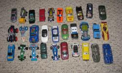 Hello, we are selling a small lot of 30 small toy cars. A few of them are Hot Wheels, most are random brands. There are definitely no rare or vintage cars here, they are just for toys for kids.
The cars are in good to very good condition. Some have more