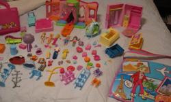 For sale are all the Polly Pocket pieces pictured, includes 5 vehicles, a plane, helicopter, 5 dolls with clothes and accessories, a modeling stage, cupboards/closets, 2 carrying bags, etc