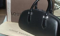 Never used Louis Vuitton leather purse. Original packaging. Original purchase price $1389.00. Purchased at Louis Vuitton Banff. Selling for $350 or best offer. Will pay for shipping if necessary. Please call 306-898-2039.