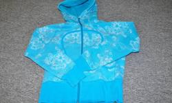Lululemon Hoody, unique floral design, aqua blue colour.  Good condition.  Since the riptag is out, I am not sure of exact size.  I am guessing it is about a 4.  30.00