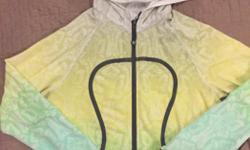 Lululemon Scuba Hoodie, white with grey, yellow and mint green pattern. Hardly worn. Size 10.