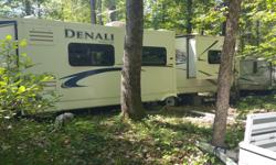 2010 Denali Superlite 32' Travel Trailer with tons of features:
- has been on lot in Calabogie, on jacks/blocks since delivery so tires are in excellent condition
- air conditioner and furnace work great
- large front galley, with microwave
- dining table