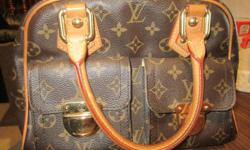 LV Purse.  Purchased from Holt Renfrew in Vancouver.
Excellent Condition.